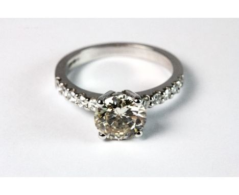 18ct white gold ring set with a solitaire diamond approx 1.75ct and diamond set shoulders (N). Est. £2800 - 3200