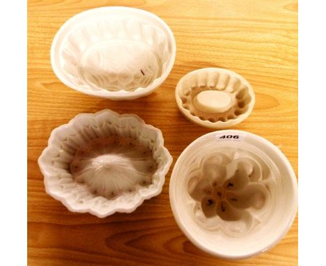 Four ceramic jelly moulds