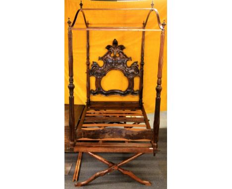 A Superb 18th/19thC Spanish hardwood missionary's collapsible bed with canopy for mosquito net and original carrying trunk 20