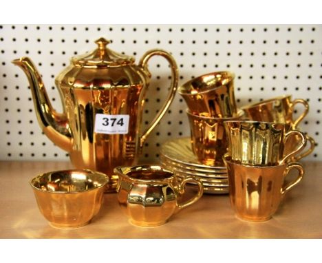 A Wade Royal Victoria gold plated coffee set