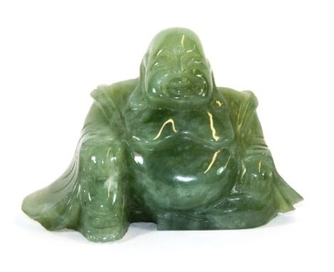 A Carved jade figure of a  seated happy Buddha (9cm)