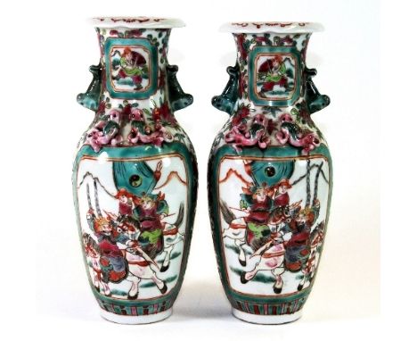 A Pair of mid 20thC Chinese famille rose enamel vases (H:25cm)