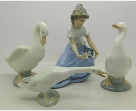 Two Nao geese, a Lladro goose and a Nao figure of a girl with puppy