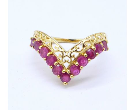 A silver gilt ruby set wishbone ring, N