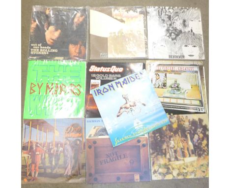Ten LP records, The Beatles, The Who, The Rolling Stones, Led Zeppelin, etc.