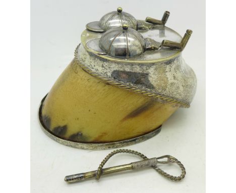 A horse's hoof with mounted double inkwell in silver plate with hinged jockey cap lids, a/f