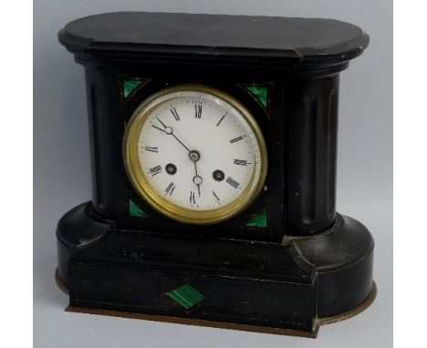 A late 19th century French black slate mantle clock, the white enamel dial, unsigned, to an eight day movement striking on a 