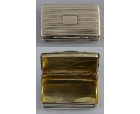 A George IV silver snuff box, by Nathaniel Mills, Birmingham 1826, of waisted rectangular form with all over ribbed decoratio