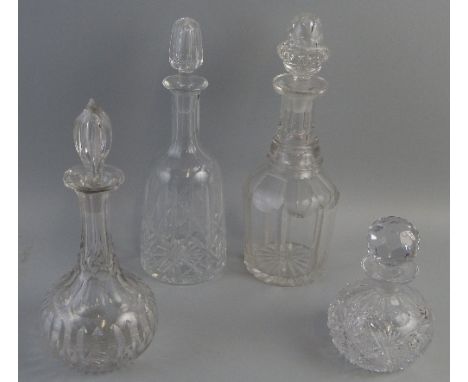 A 19th century clear glass decanter, of mallet shaped form with deep cut body, star cut base and matching stopper, 33cm high,