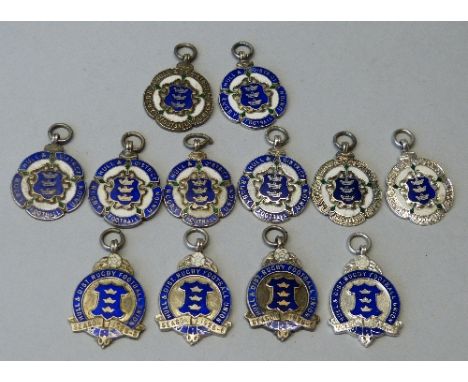 Of Hull and District Rugby Football Union interest; a collection of twelve silver and enamel medals, Birmingham 1922 to 1926,