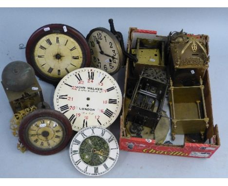 A brass lantern clock, incomplete, four various lantern clocks, incomplete, a white enamel dial, signed John Walker, with a f