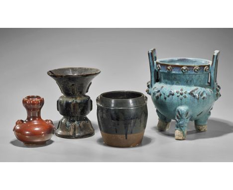 Four Antique Chinese Flambé Glazed VesselsGroup of four antique Chinese flambé glazed vessels: large tripod censer, spitoon, 