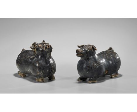 Two Antique Jin-Style Glazed Pottery AnimalsTwo antique Chinese Jin-style dark brown glazed pottery animals; of a plump pig a