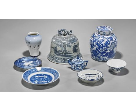 Group of Eight Asian Blue & White PorcelainsGroup of eight various Asian blue and white porcelains: large cover, teapot, vase