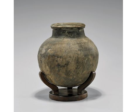 Early Chinese Pottery VesselEarly Chinese pottery vessel; of rounded, bulbous form, with short neck and a lipped rim; probabl
