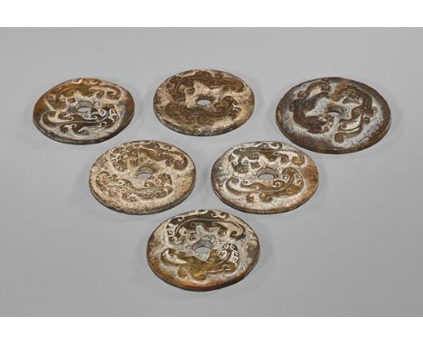 Six Large Chinese Carved Bi PendantsGroup of six Chinese carved jade/ hardstone bi pendants; each with a pair of chilong or h