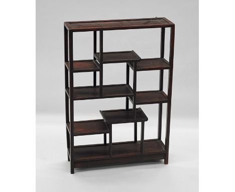 Chinese Carved Hardwood Display ShelfChinese carved hardwood display shelf; of cube form with several multi-tiered shelves; t