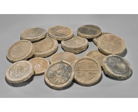 Fifteen Antique Chinese Pottery Roof TilesGroup of fifteen, antique Chinese pottery roof tile ends; of circular form with arc
