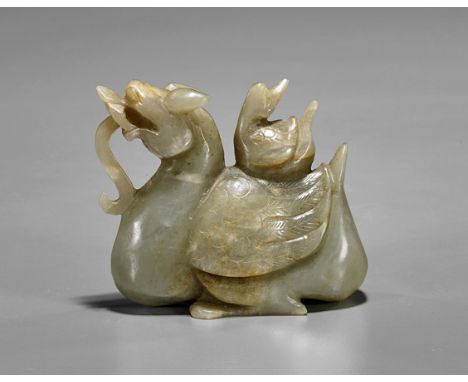 Chinese Celadon Jade Qilin & Duck CarvingChinese Song-style celadon jade carving; a recumbent qilin with a small duck on its 