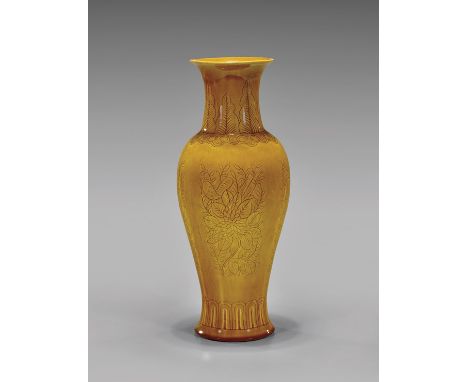 Antique Chinese Monochrome Yellow VaseTall and antique, Chinese Kangxi-style monochrome yellow porcelain vase; of baluster fo