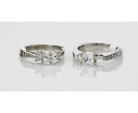 Two 14K White Gold Solitaire Engagement RingsTwo 14K white gold engagement rings; each centering a square-cut cubic zirconia 