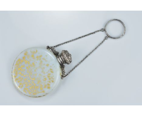 An antique Victorian painted opaline circular perfume scent bottle with white metal cap and original glass stopper, attached 