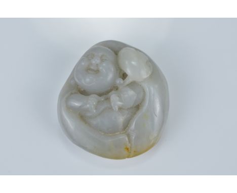 A Chinese carved jade pendant carved as a laughing Buddha. 5.5cm x 5cm