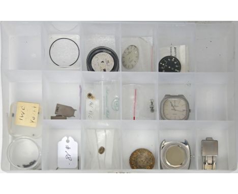 Konvolut Ersatzteile IWC. Dabei vier Zifferblätter (1x rest.), fünf (Fisch)-Kronen, zweimal vergoldet, dreimal Edelstahl, Ers