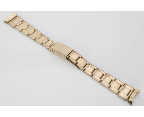 ROLEX-Oysterband. Stahl, rot vergoldet und genietet. Schließe 1/56. Bandanstöße 16 mm, L. ca. 17 cm. Herstellung 1. Quartal 1