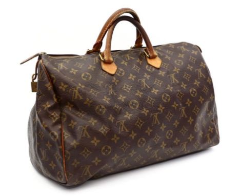 "Speedy 40", Louis Vuitton. Monogram Canvas, braune Beschläge (starke Verfärbungen und Abrieberscheinungen). Messingfarbene H
