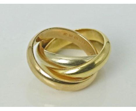 Trinity-Ring, Cartier. 750/000 GG, WG und RG, 11,4 g.  Ringschiene sign. "Cartier", num. "JE983" und mit Größenangabe "47". L