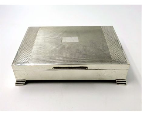 Silver cigarette box, engine turned decoration, stepped bracket feet by Edward Viners, Sheffield 1958, L16.5cm    Condition R