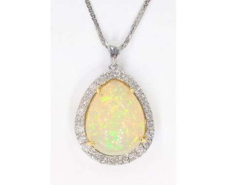 18ct natural opal and diamond cluster pendant necklace stamped 750, opal approx 11ct   Condition Report   Click here for furt