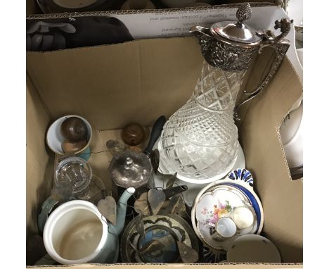 Two boxes of assorted decorative items to include a claret jug with plated mounts, various glass tazzas / comports, stoneware