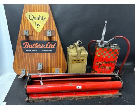 A Butlers Ltd. display stand for spotlights, an Esso Blue Paraffin  can. a Carburol can with dispenser and a Ripaults auto ca