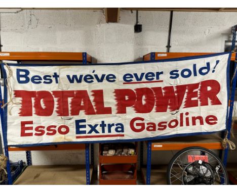 An Esso Extra Gasoline Total Power canvas advertising banner, 91 x 32 1/2". 