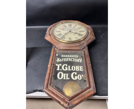 A Diamond Black Leather Oil advertising clock for T. Globe Oil Co. 