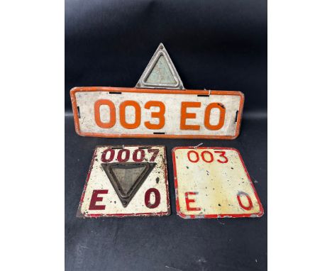 Three motor vehicle dealer trade plates, one for 1984, one dateless and an enamel early version for 1921. 