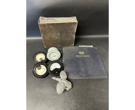 An autojumbler's lot including a car accessory mascot, Esso maps, Ordnance Survey Maps of England and Wales and four gauges. 