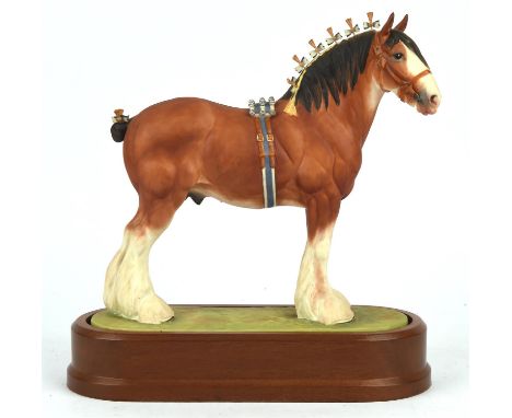 Doris Lindner, a Royal Worcester porcelain model of the Clydesdale Stallion, on a wooden stand, 28cm highCondition Report:  T
