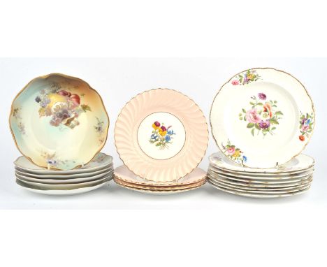 A group of porcelain/pottery side/dessert plates, to include a set of four floral decorated plates, printed to the front 'TRI