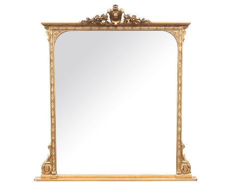 Victorian painted gesso overmantel mirror, with a central shield shaped cresting flanked by flowers, the frame with scale and