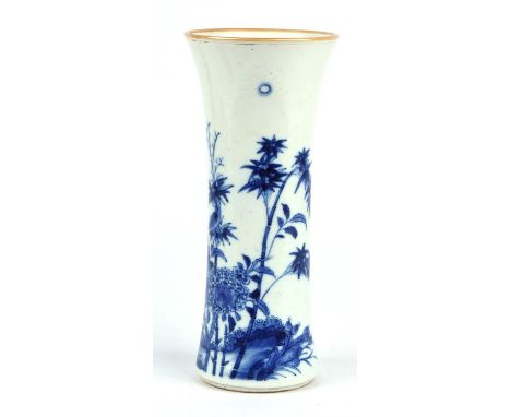 A blue and white trumpet vase, decorated with a bird perched on a flowering peony branch; 21.5 cm high; the base unglazed; Tr