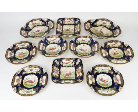 A Booths/Spode pottery part dinner/dessert service, decorated in the manner of Worcester, printed and painted with birds on b