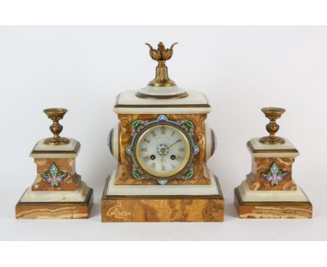 A French onyx, yellow fossil marble and enamel clock garniture by Eugene Cornu, late 19th Century, the clock case of architec