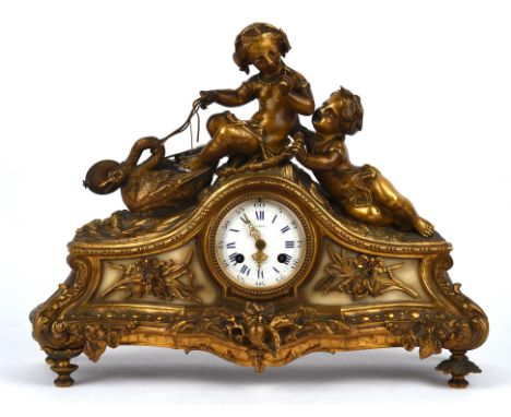 Farret a Paris, ormolu and white marble mantle clock the white enamel dial with blue Roman numerals, surmounted two by childr