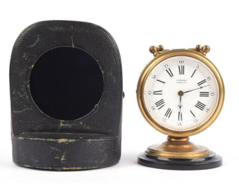 Late 19th century brass drum traveling clock, the white enamel dial signed Norman, Pimlico, in original fitted leather case H