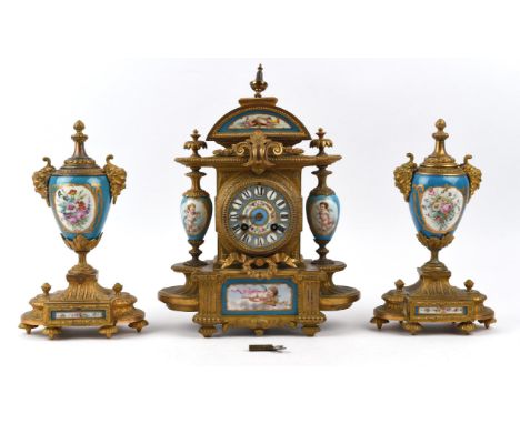 French gilt metal and Sevres style porcelain clock garniture, 19th Century, the clock with architectural form case, decorated