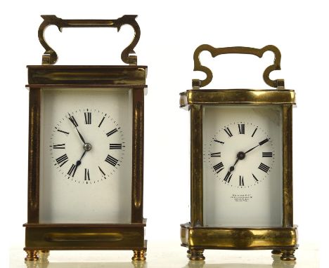 A French brass cased carriage clock, the corners fluted and with bevelled glazed panels, back stamped 'Made in France', 14cm,