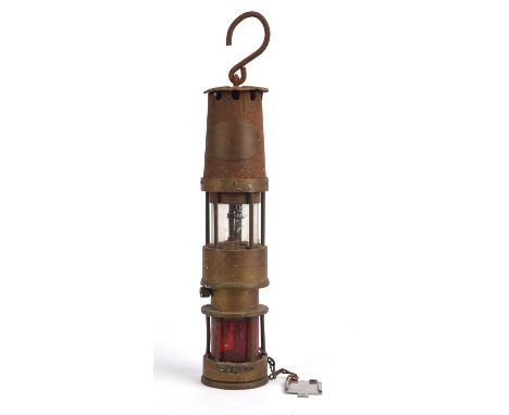 A Spiralalarm miners/sewer safety lamp by J H Taylor of Wigan, 35cm high